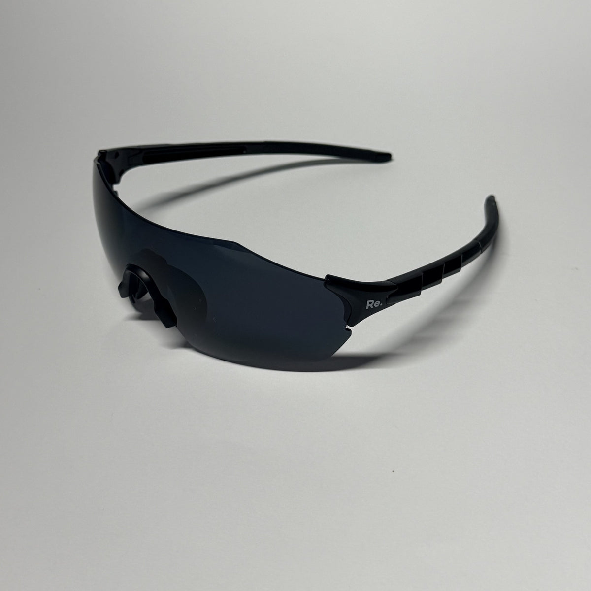 Re.flex: Protector Black Running Sunglasses