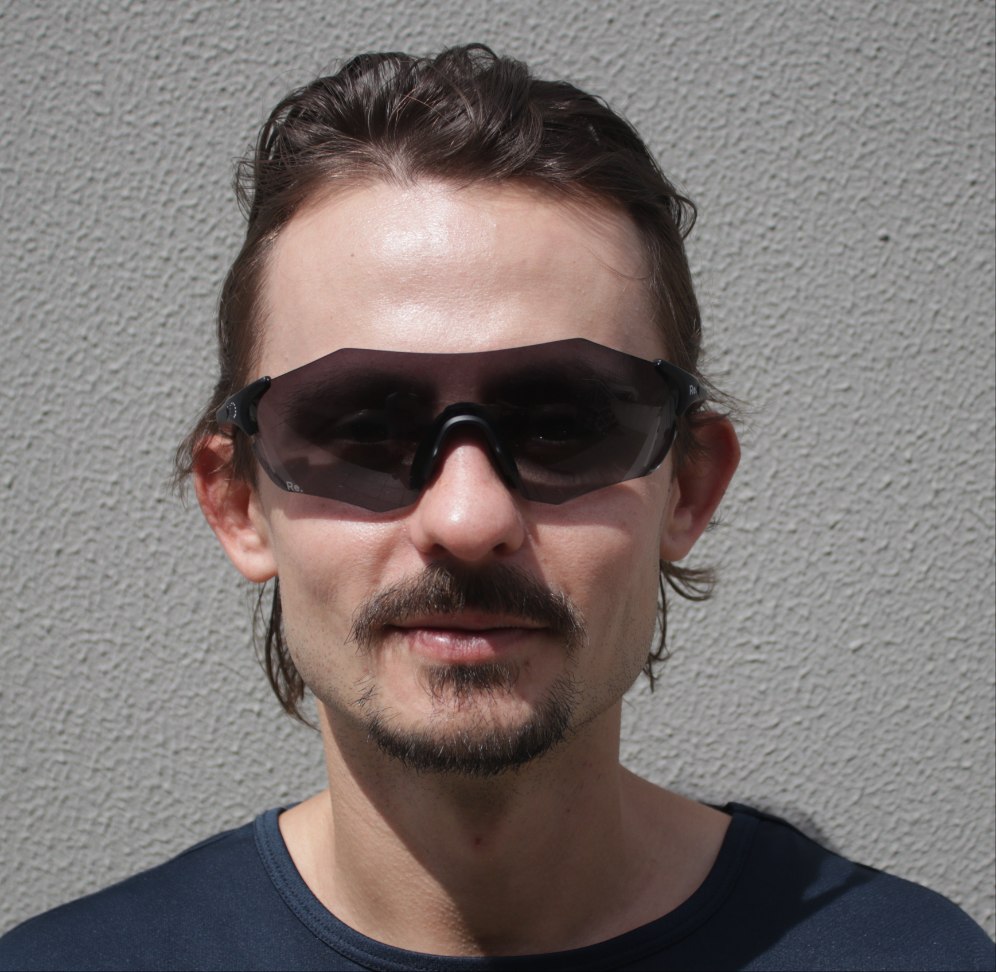 Man wearing running sunglasses