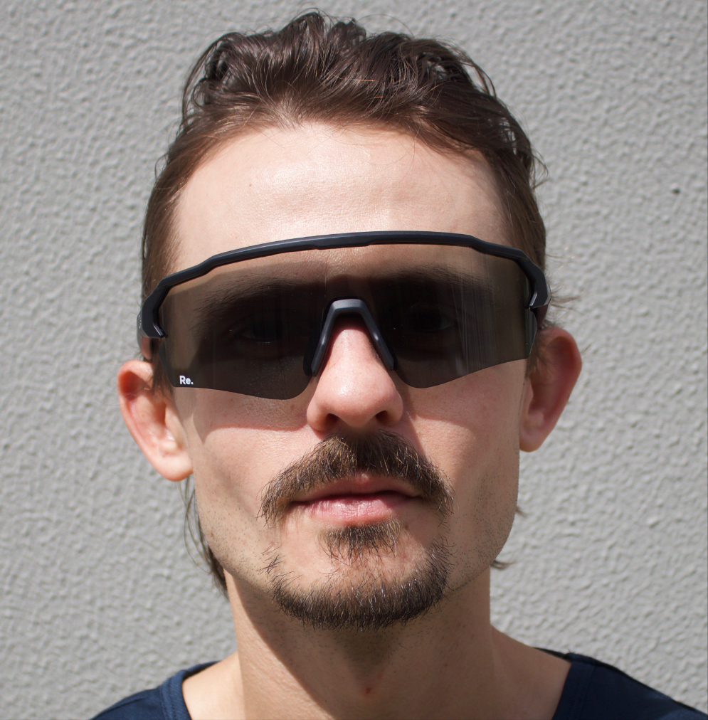 Man wearing running sunglasses