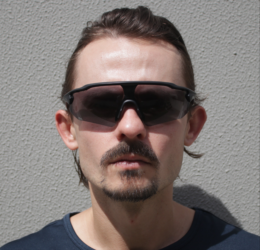 Man wearing running sunglasses