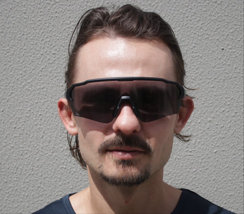 Man wearing running sunglasses