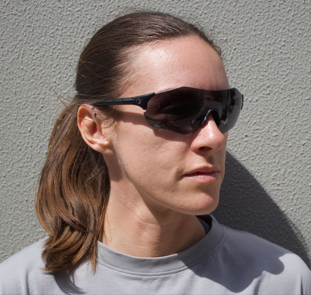 Woman wearing running sunglasses