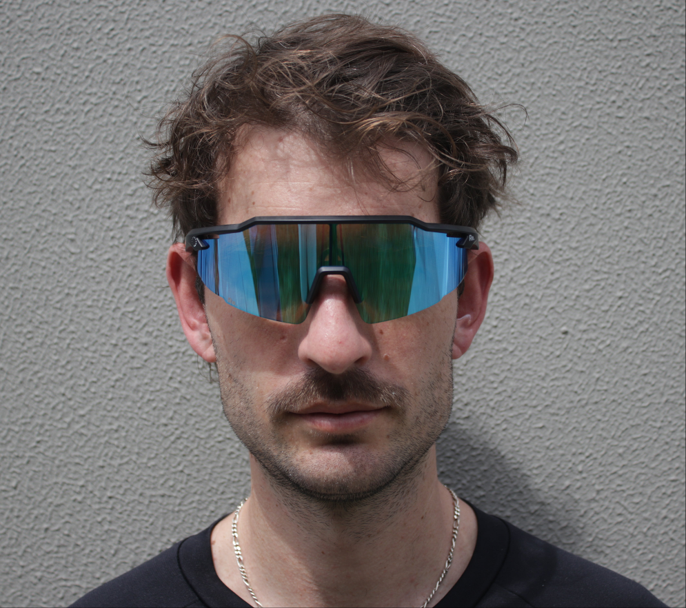 Man wearing running sunglasses