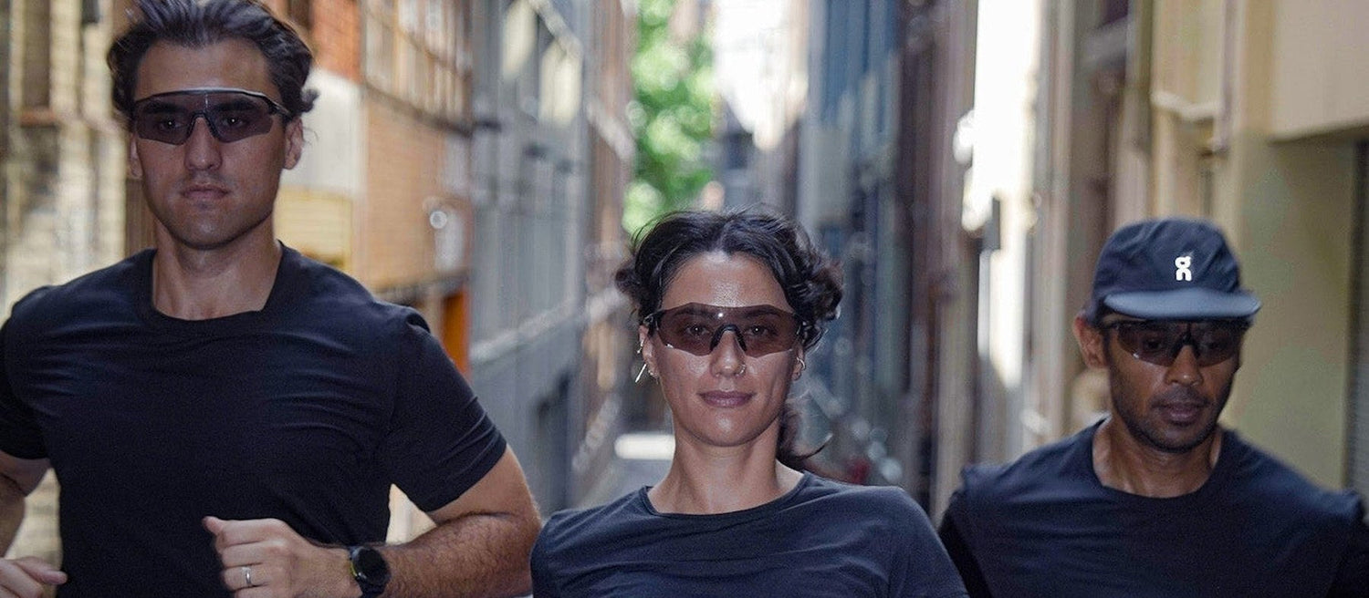 Runner wearing sunglasses outdoors protecting eyes from UV