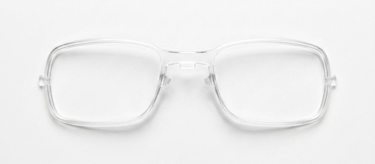Prescription Lens Insert sitting behind the lens of a Re. Performance running sunglass frame