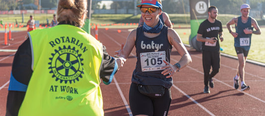 Runners in motion at a running festival, illustrating training and shin splints prevention