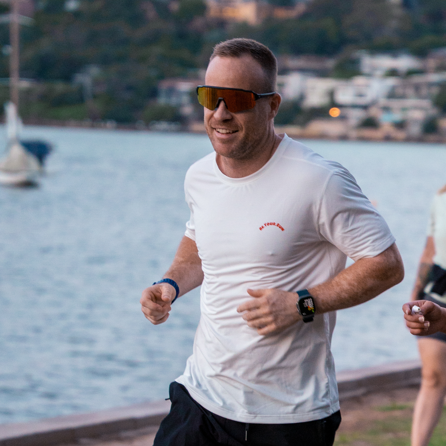 Re.silience: Purity Orange Running Sunglasses