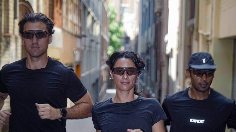 runners in running sunglasses, urban 