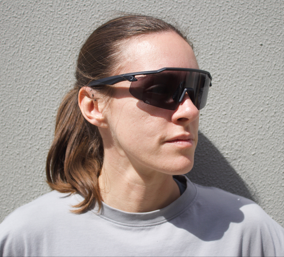 Woman wearing running sunglasses 