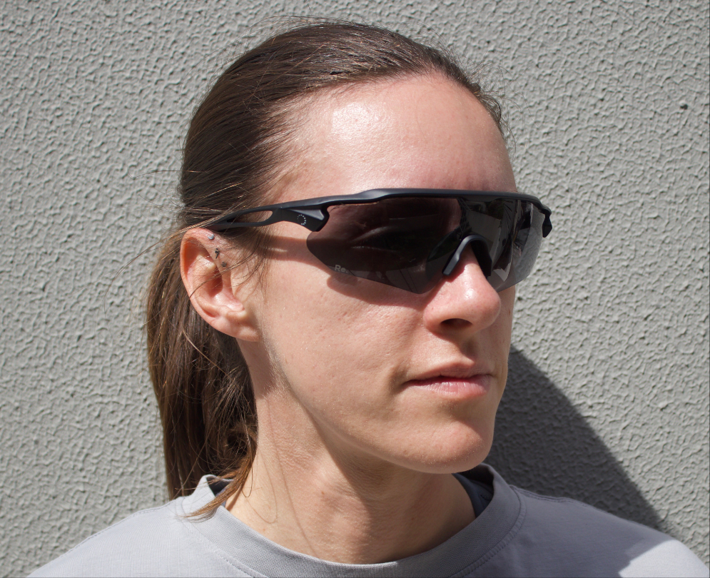 Woman wearing running sunglasses 