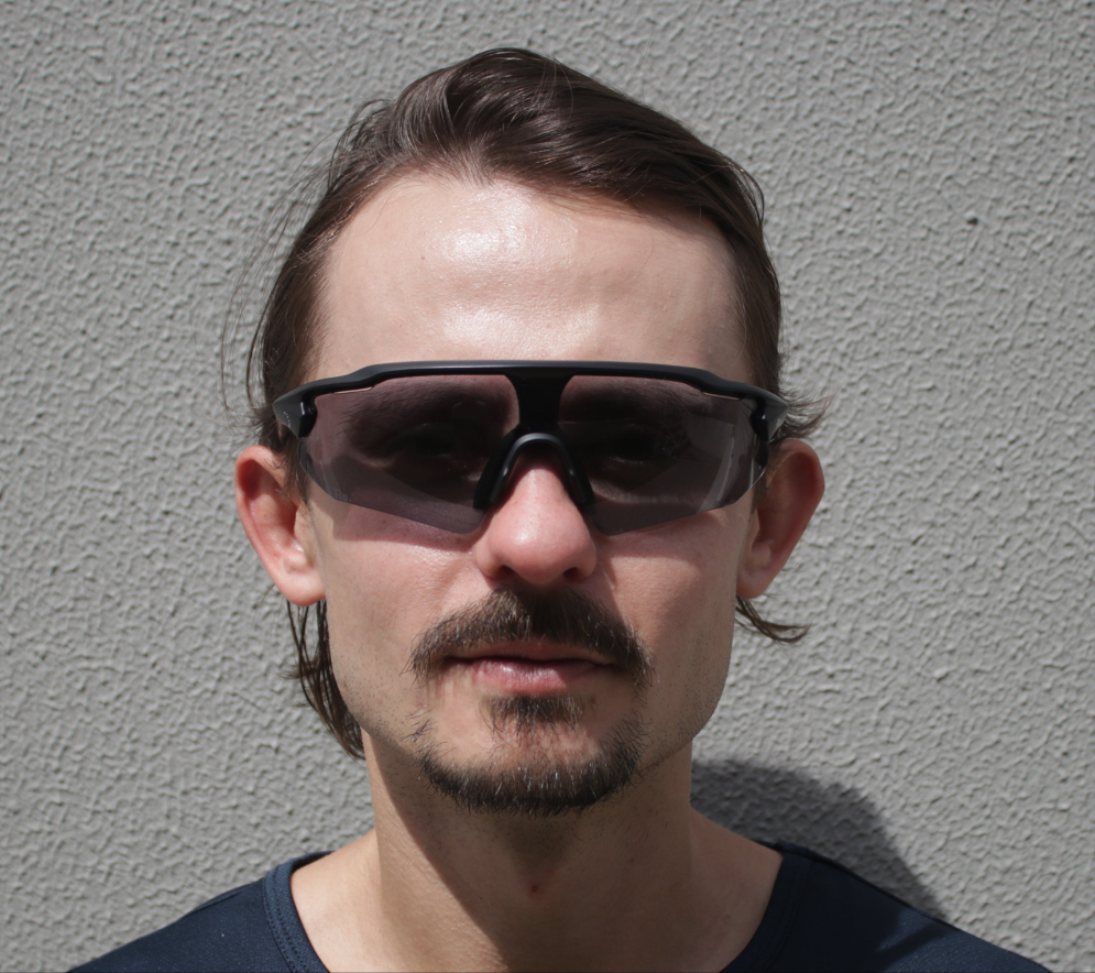 Man wearing running sunglasses 