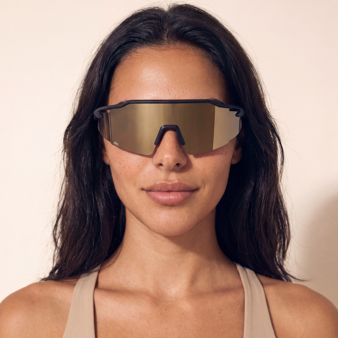 Re.balance Protector Gold Running Sunglasses model headshot female